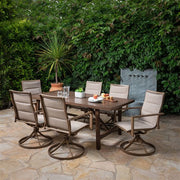 Hanover - Fairhope 7pc Dining Set: 6 Swivel Chairs and 74x40 Tressle Table - Tan-United Backyard