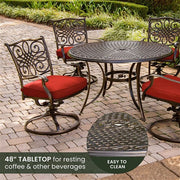 Hanover - Traditions 5pc: 4 Swivel Rockers, 48" Round Cast Table - Red/Cast-United Backyard