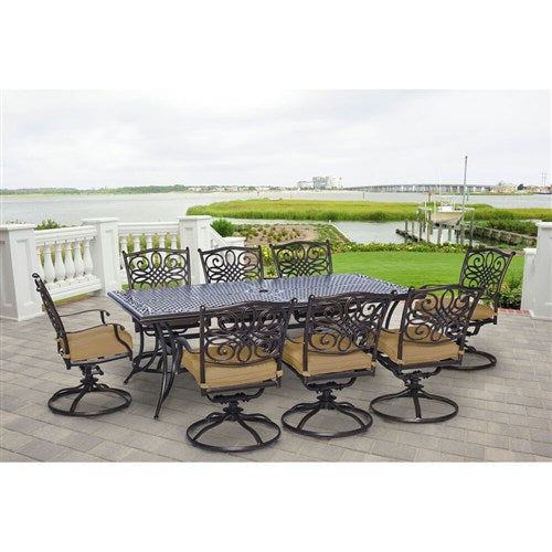Hanover - Traditions 9pc: 8 Swivel Rockers, 42x84" Cast Table - Tan/Cast-United Backyard
