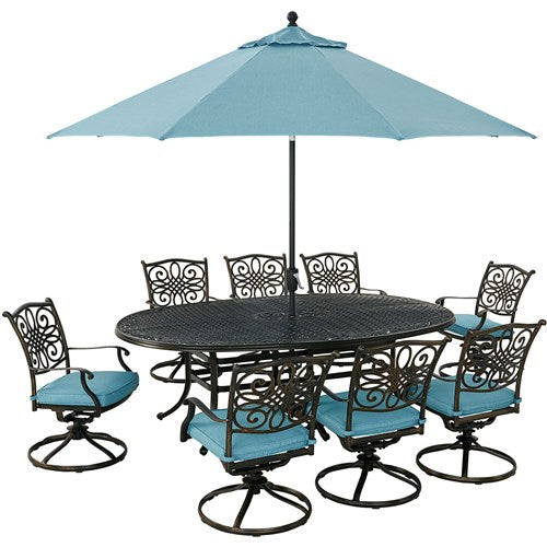 Hanover - Traditions 9pc: 8 Swivel Rockers, 96"x60" Oval Cast Table, Umbrella, Base - Blue/Bronze-United Backyard