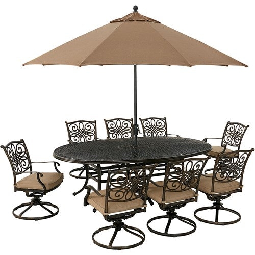 Hanover - Traditions 9pc: 8 Swivel Rockers, 96"x60" Oval Cast Table, Umbrella, Base - Tan/Bronze-United Backyard